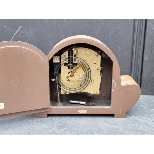 1194 - An onyx and gilt metal mantel clock, 39cm high; together with a 1940s walnut mantel timepiece. ... 