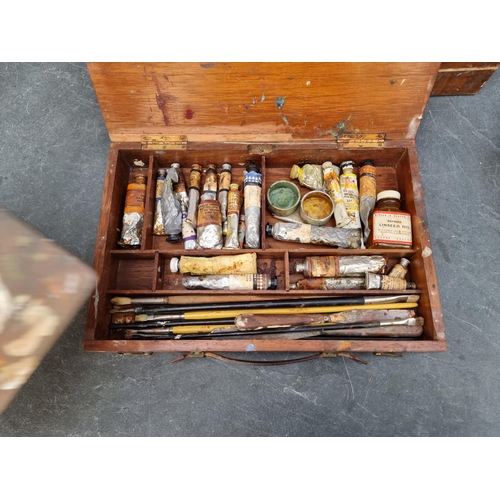 1200 - Four vintage artist's paint boxes, one labelled 'Winsor & Newton'.