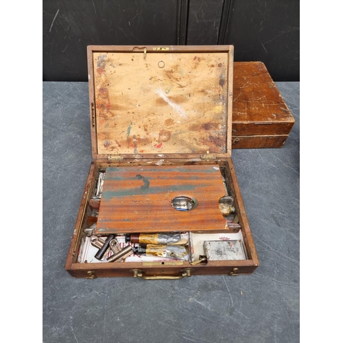 1200 - Four vintage artist's paint boxes, one labelled 'Winsor & Newton'.