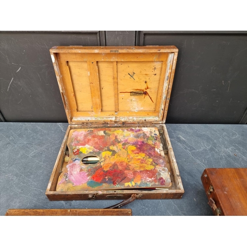 1200 - Four vintage artist's paint boxes, one labelled 'Winsor & Newton'.