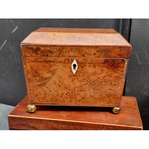 1204 - A George III burr yew and line inlaid tea caddy, with bone escutcheon, 18cm wide; together with four... 