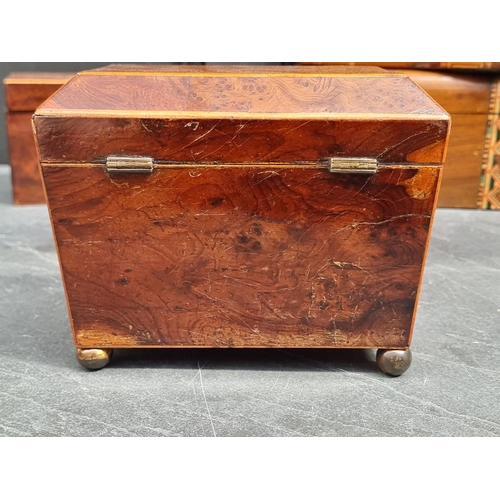 1204 - A George III burr yew and line inlaid tea caddy, with bone escutcheon, 18cm wide; together with four... 