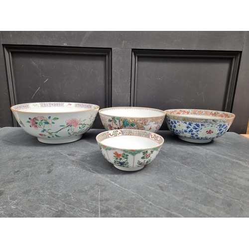 1205 - Three Chinese famille rose bowls, largest 34cm diameter; together with another Kangxi famille v... 