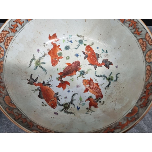 1205 - Three Chinese famille rose bowls, largest 34cm diameter; together with another Kangxi famille v... 