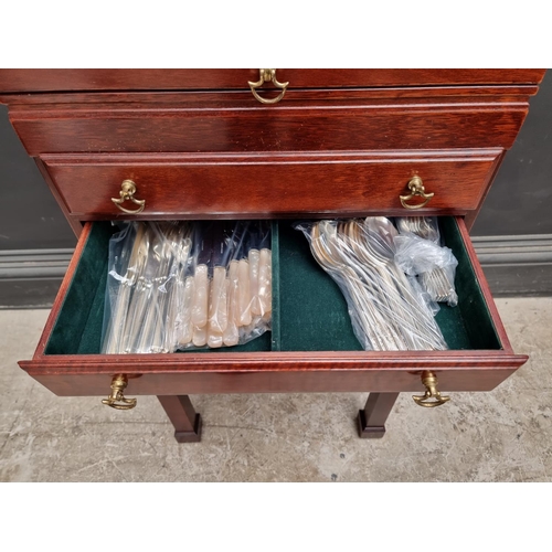 1217 - A collection electroplated cutlery, in mahogany four drawer chest, 44.5cm wide.... 