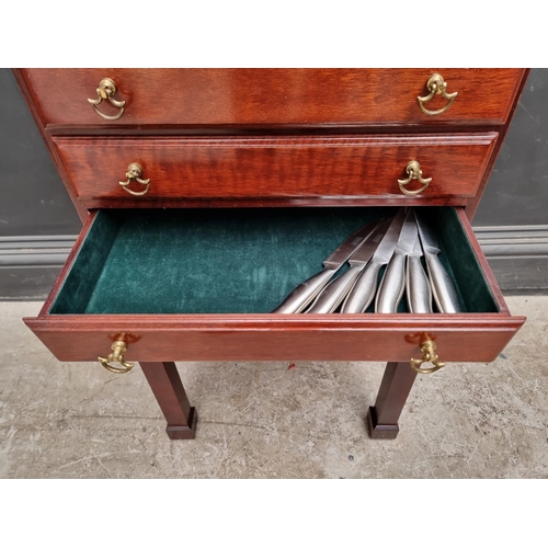 1217 - A collection electroplated cutlery, in mahogany four drawer chest, 44.5cm wide.... 