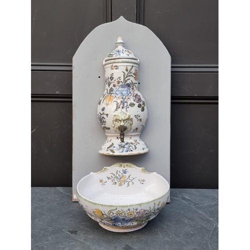 1218 - An antique French tin glazed pottery fountain, the body and cover 43cm high, (cover and bowl associa... 