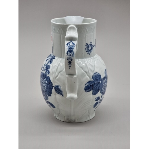 1243 - A Worcester first period mask jug, printed with the 'Natural Sprays' pattern, 20cm high.... 