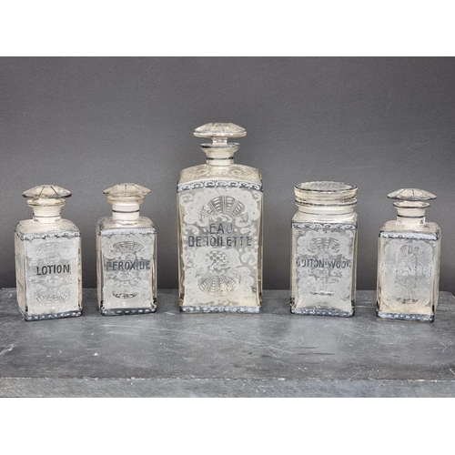 1244 - A set of five early 20th century French etched glass toilet jars and stoppers, largest 21cm high. (5... 