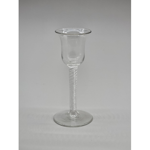 1248 - An 18th century combined twist stem wine glass, 15.5cm high.