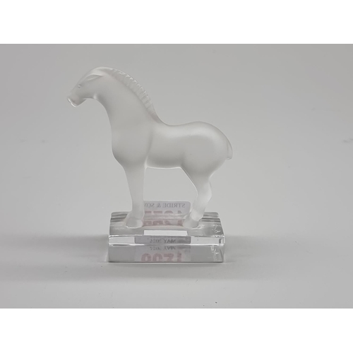 1255 - A Lalique frosted glass Tang horse, 10cm high.