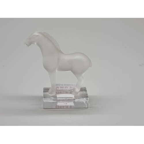 1256 - A Lalique frosted glass Tang horse, 10cm.