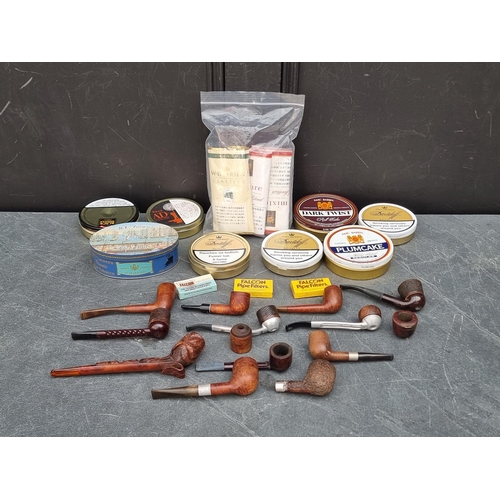 1266 - A collection briarwood pipes and various tobacco.