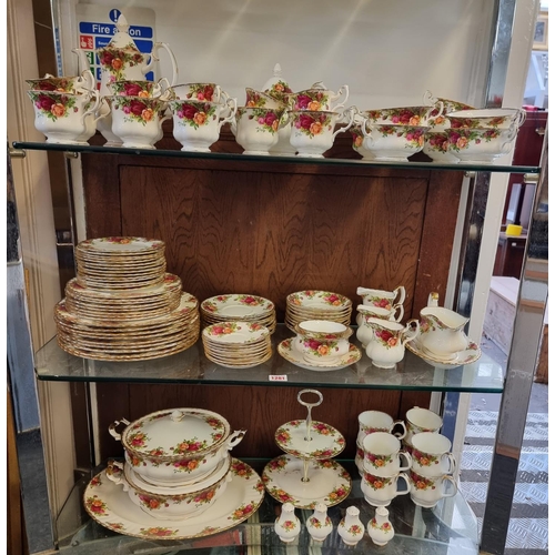 1281 - An extensive Royal Albert ‘Old Country Roses’ pattern tea and dinner service, (some seconds).... 