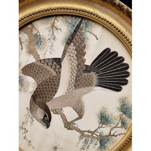 1296 - A fine 19th century Japanese silk embroidered Falcon, 32cm diameter.