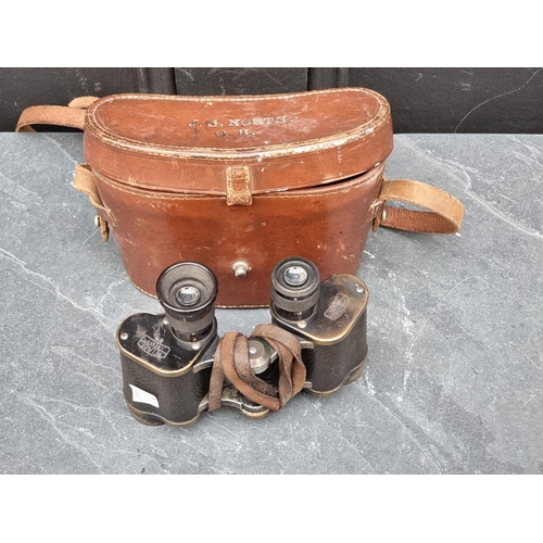 1309 - A pair of Carl Zeiss Telact 8X binoculars, cased.