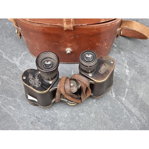 1309 - A pair of Carl Zeiss Telact 8X binoculars, cased.