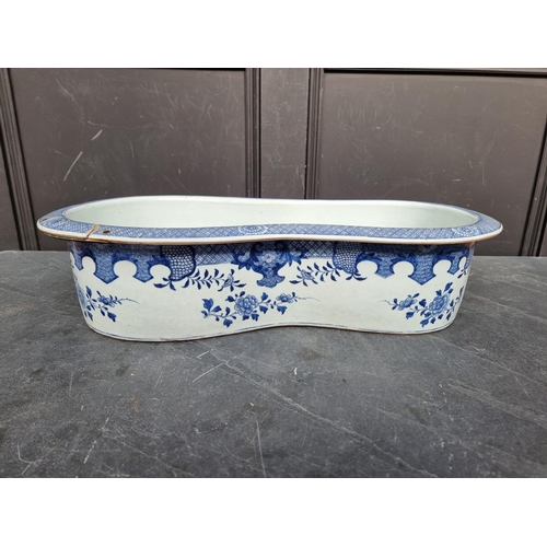 1347 - A late 18th century Chinese blue and white bidet, 60.5cm long, (repaired).