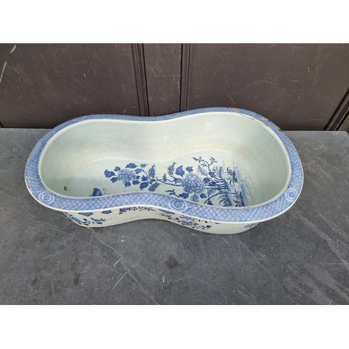 1347 - A late 18th century Chinese blue and white bidet, 60.5cm long, (repaired).