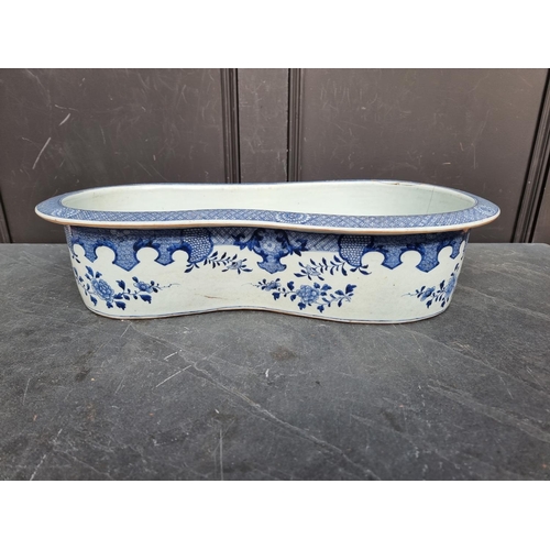 1347 - A late 18th century Chinese blue and white bidet, 60.5cm long, (repaired).