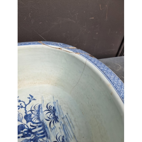 1347 - A late 18th century Chinese blue and white bidet, 60.5cm long, (repaired).