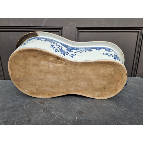 1347 - A late 18th century Chinese blue and white bidet, 60.5cm long, (repaired).