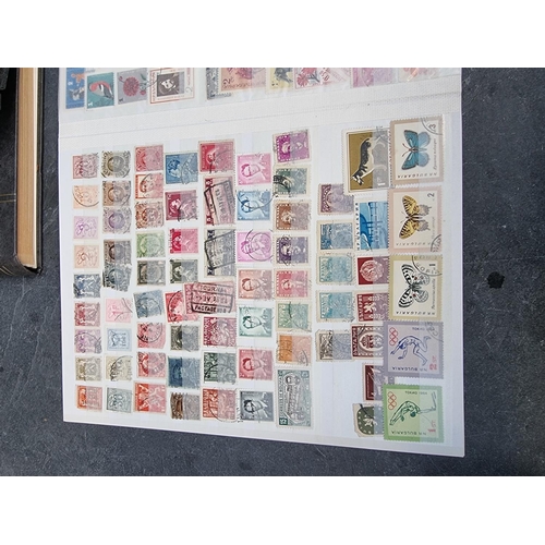 1350 - Stamps: three albums and two stockbooks. (5)