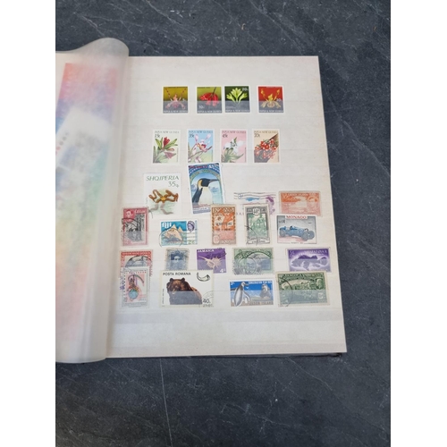 1350 - Stamps: three albums and two stockbooks. (5)