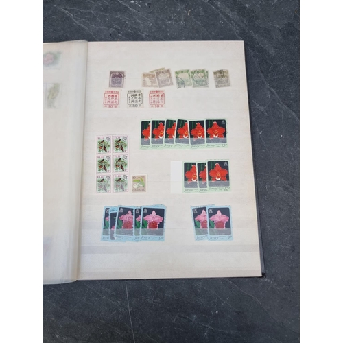 1350 - Stamps: three albums and two stockbooks. (5)