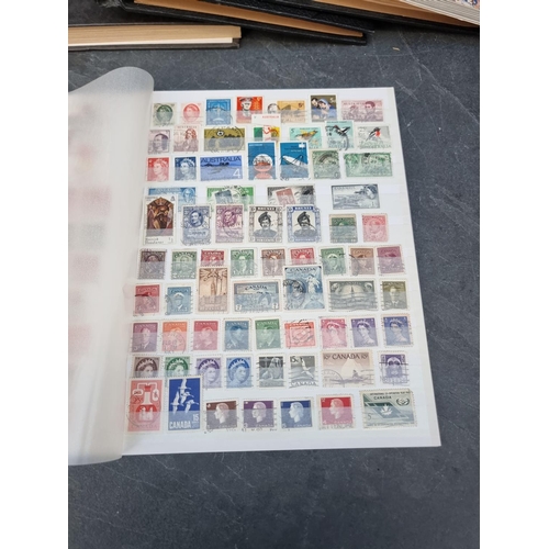 1350 - Stamps: three albums and two stockbooks. (5)