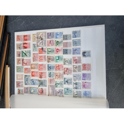 1350 - Stamps: three albums and two stockbooks. (5)