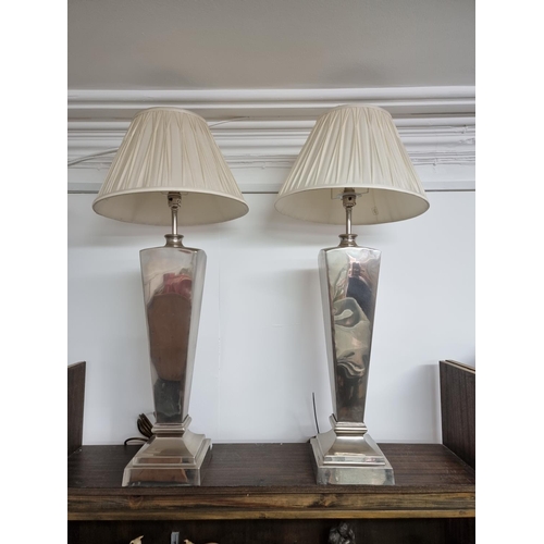 1360 - A large pair of metal table lamps, total height 82cm.