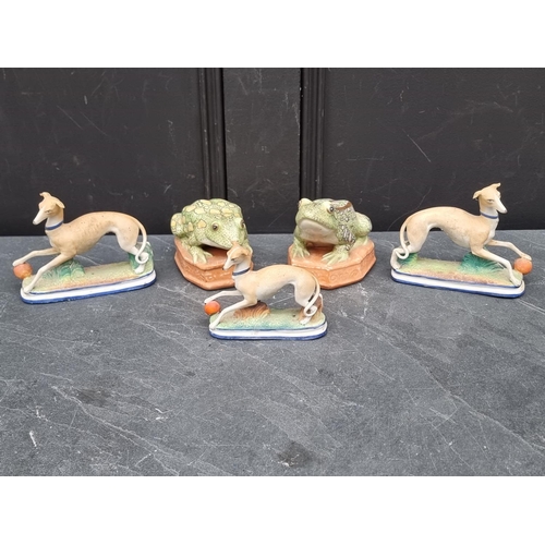 1361 - Three Continental porcelain greyhounds, largest 15cm wide; together with a pair of Continental porce... 