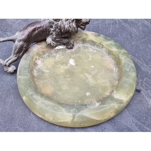 1381 - A lion mounted green onyx dish, the dish 23.5cm diameter. 