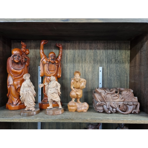 1402 - A group of Chinese and Japanese carved wood figures and similar, largest 36.5cm high. (6)... 