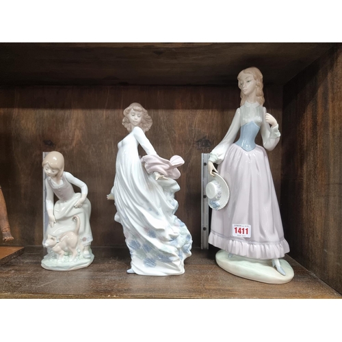 1411 - Three Lladro figures, largest 36.5cm high.