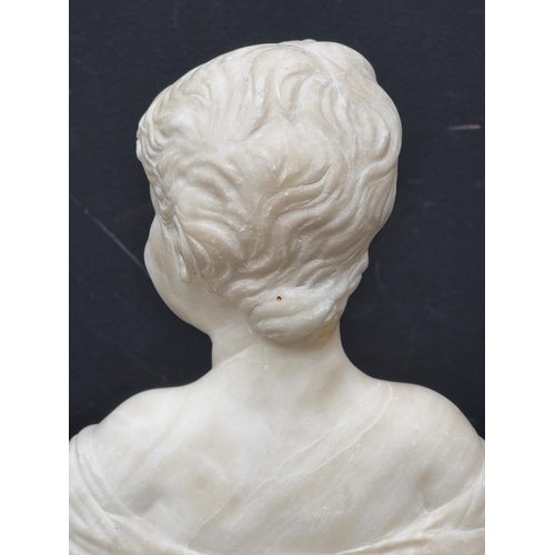 1415 - An alabaster bust of a young girl, 21.5cm high.