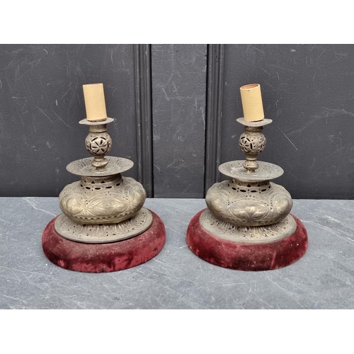 1416 - A pair of Islamic pierced metal table lamps, total height 23.5cm.