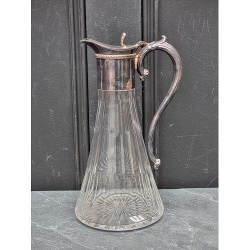 1424 - A cut glass and electroplate mounted claret jug, 28.5cm high.