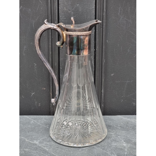 1424 - A cut glass and electroplate mounted claret jug, 28.5cm high.