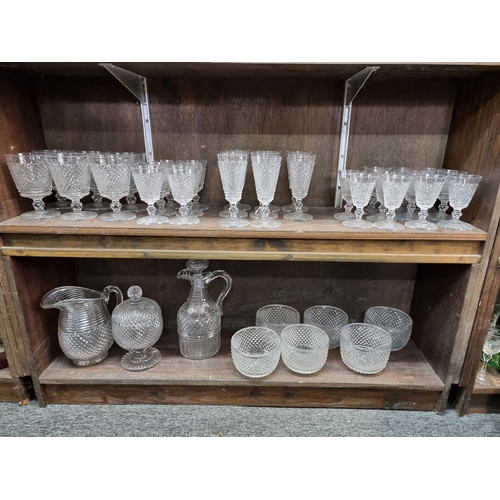 1428 - A good suite of early 19th century cut glass, possibly Irish. (40)