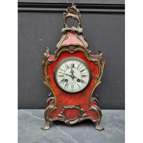 1441 - A Louis XV style tortoiseshell mantel clock, 39.5cm high, with pendulum.