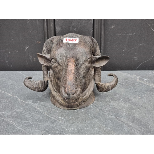 1447 - A bronze ram's head, 14cm high.