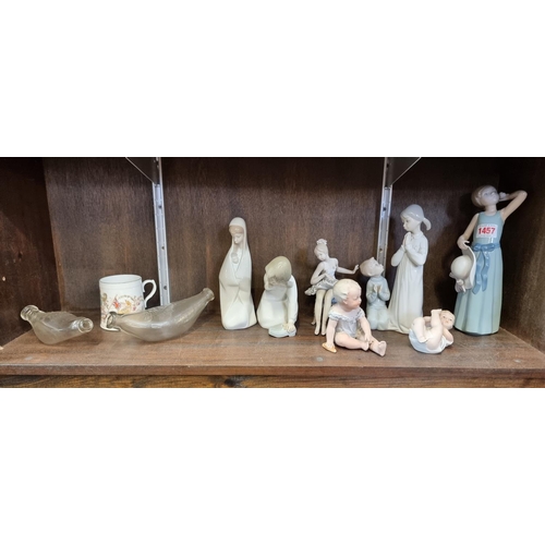 1457 - Five Lladro figures, largest 25cm high; together with two glass baby feeders; and three other items.... 