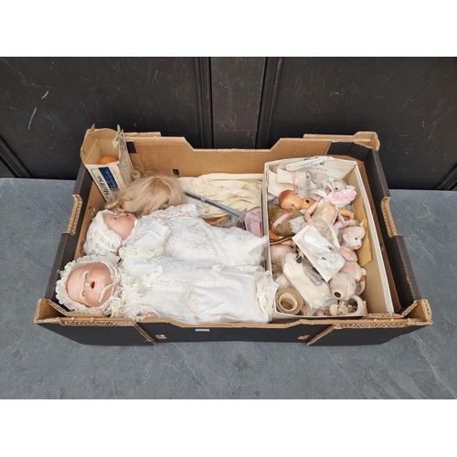 1458 - Dolls: two Armand Marseille 'Dream Baby' dolls; together with bisque head doll parts and related ite... 