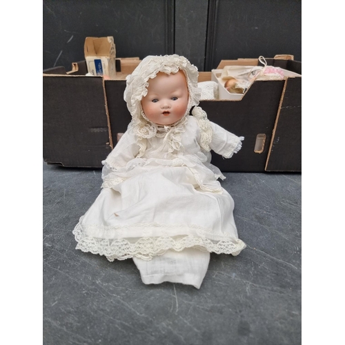 1458 - Dolls: two Armand Marseille 'Dream Baby' dolls; together with bisque head doll parts and related ite... 