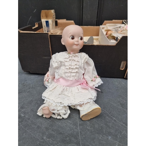 1458 - Dolls: two Armand Marseille 'Dream Baby' dolls; together with bisque head doll parts and related ite... 