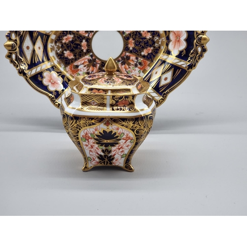 1471 - A Royal Crown Derby Imari box and cover, 10.5cm high; together with a similar lozenge dish, 23cm wid... 