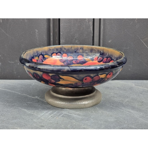 1472 - A Moorcroft Pottery for Liberty & Co 'Pomegranate' pattern pedestal bowl, with 'Tudric' pewter b... 