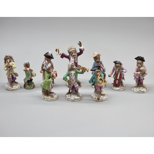 1474 - A set of nine Dresden porcelain 'Monkey Band' figures, largest 17cm high; together with another smal... 